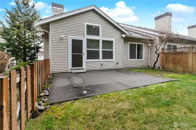 Fully-Fenced Backyard. Large Emerald Greens provide privacy and filter afternoon sun!