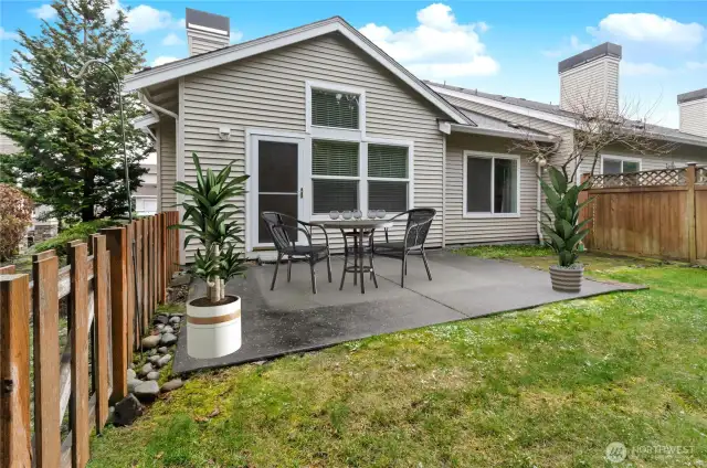 Virtually staged and fully-fenced backyard