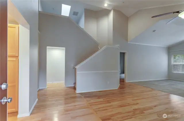 Spacious entry with access to kitchen, dining, living space and stairs. Side entry to home.