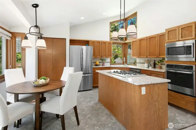 Additional view of the kitchen showcasing the cozy breakfast nook