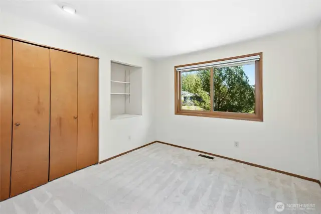 One of the four secondary bedrooms located on the main level