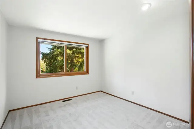 Another well-appointed secondary bedroom on the main level