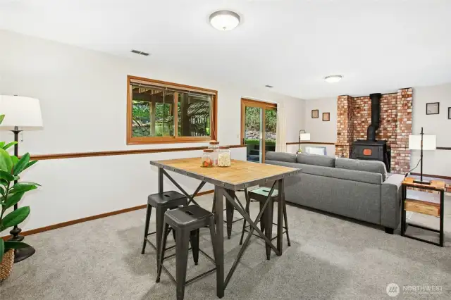 Lower-level bonus room with direct backyard access — ideal as a media, play, or fitness space