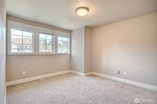 Bedroom #4 of 4.  All bedrooms have walk in closets.