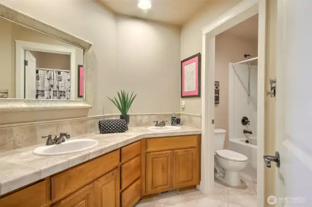 Full bathroom upstairs with double sinks.  Shower & toilet area separate.