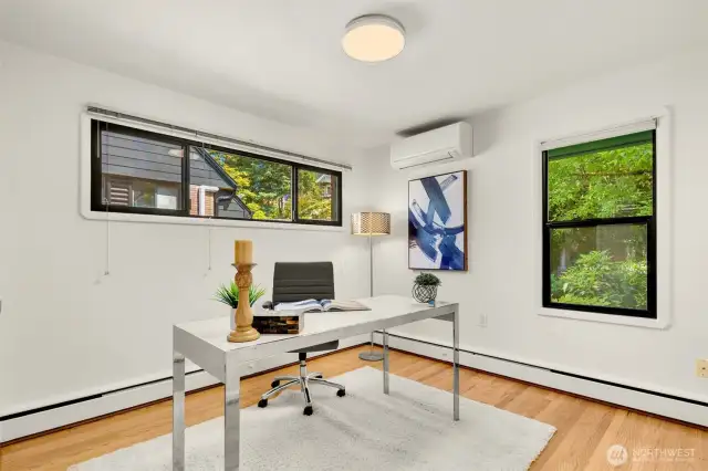 Second main floor bedroom with views of the private backyard.