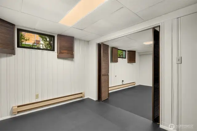 Another view of the basement space with more space around the corner.