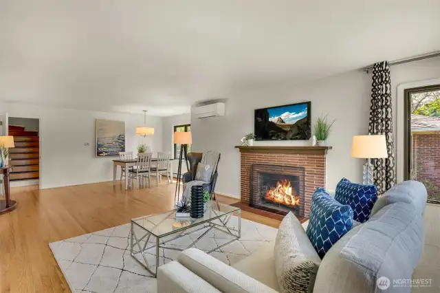 The lovely wood fireplace is the centerpiece of this comfortable space.
