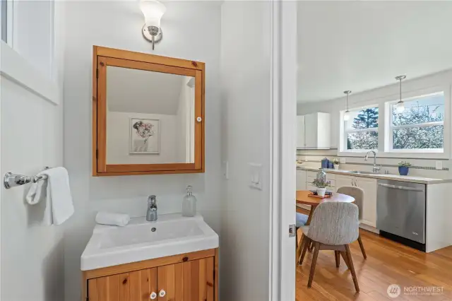 Cute half bath on the main level.