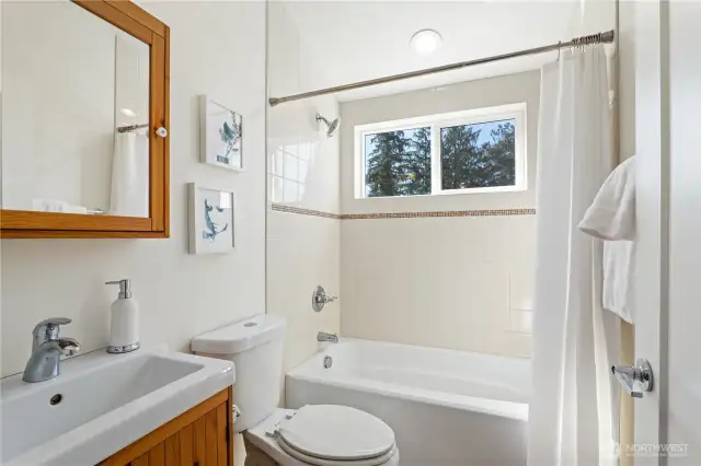 The full bathroom upstairs includes heated tile floors.