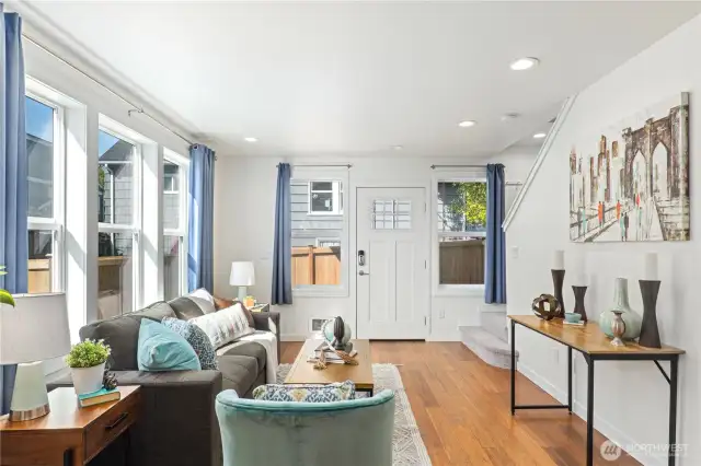 A row of south-facing windows lets in sunlight and views of your beautiful private yard.