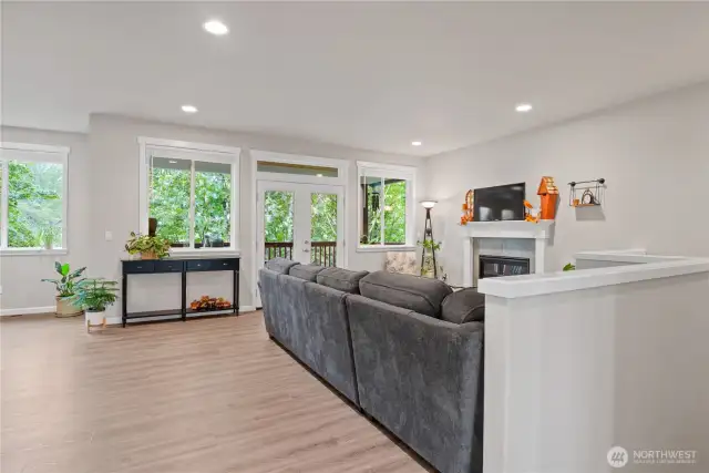 Living room with French Doors to deck on the main floor.