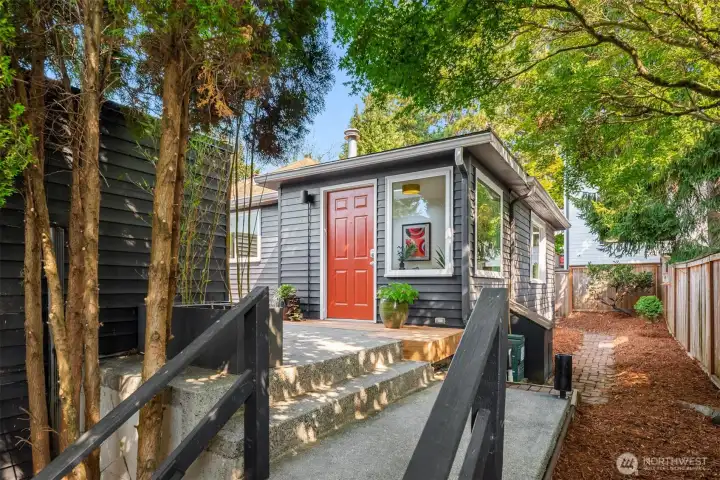 Windemere Home-Staricase to front door and patio