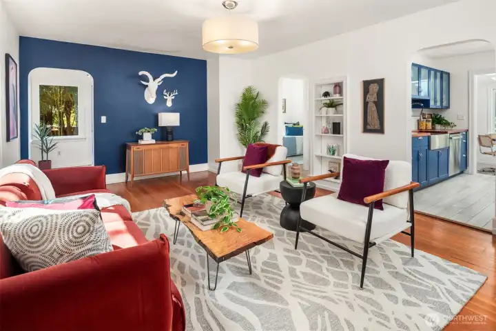 Living room with modern lighting and hardwood floor