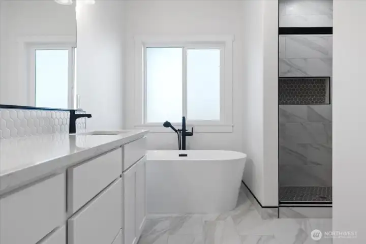 Primary bath with vessel soaking tub and walk in shower