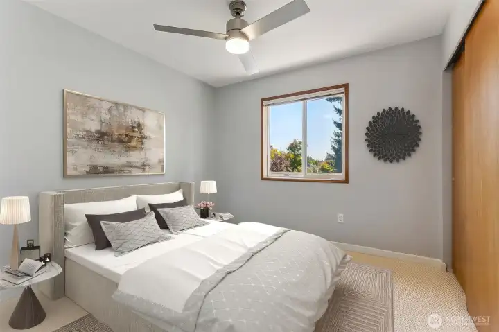 Additional Bedroom 2 of 4 inclues newer carpeting, sizeable closet space, newer paint, natural light and new ceiling fan with remote.