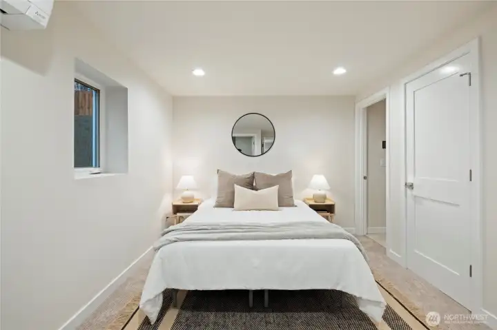 Cozy carpet, natural light, heating and cooling provided by the mini-split - this is a comfortable primary suite!