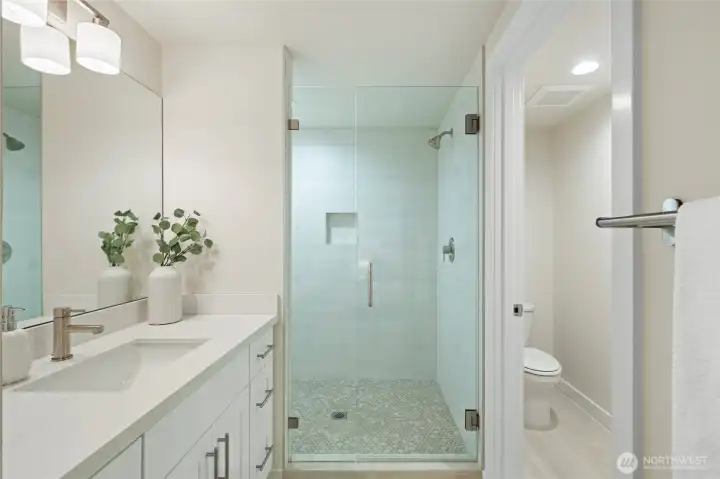 Large shower in the ensuite bath and plenty of storage in the vanity.