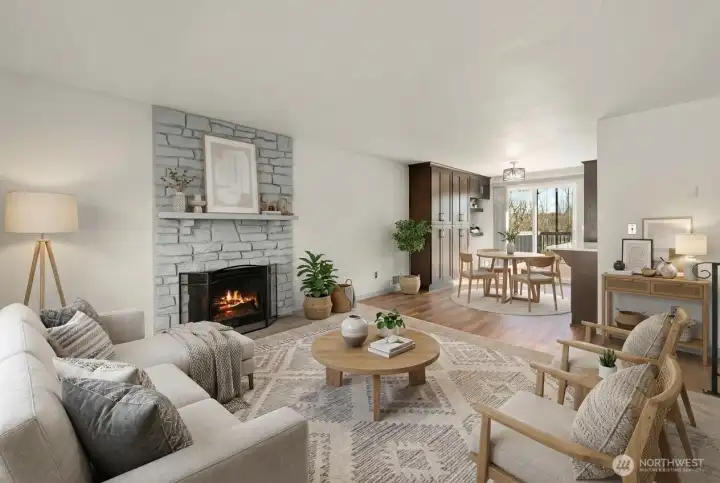 Spacious living room extends to the dining room off the fully renovated kitchen. Both are virtually staged
