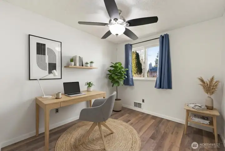 Another bedroom could be an office is virtually staged