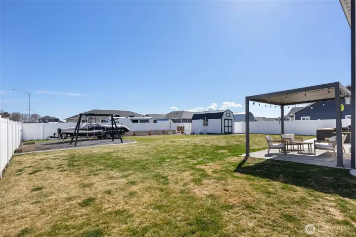 Notice side gate on fence from Grant street to the left of the boat for additional parking and access to the backyard.