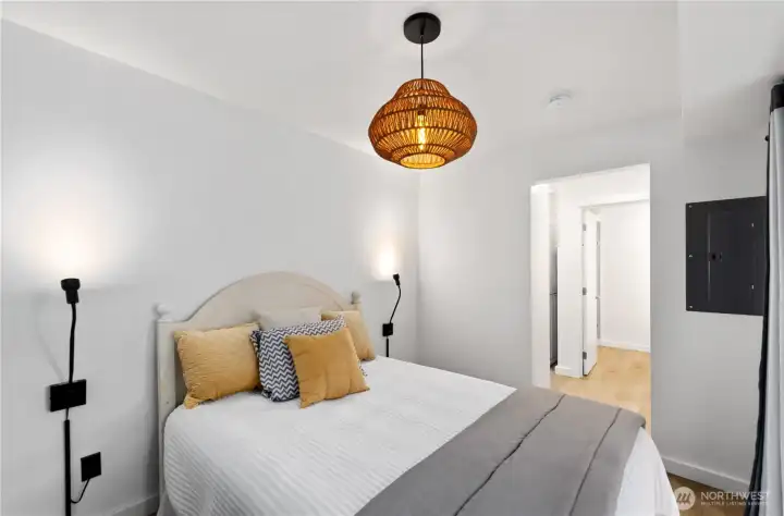 Comfortable ADU bedroom with walk-in closet, providing privacy and independence from the main home.