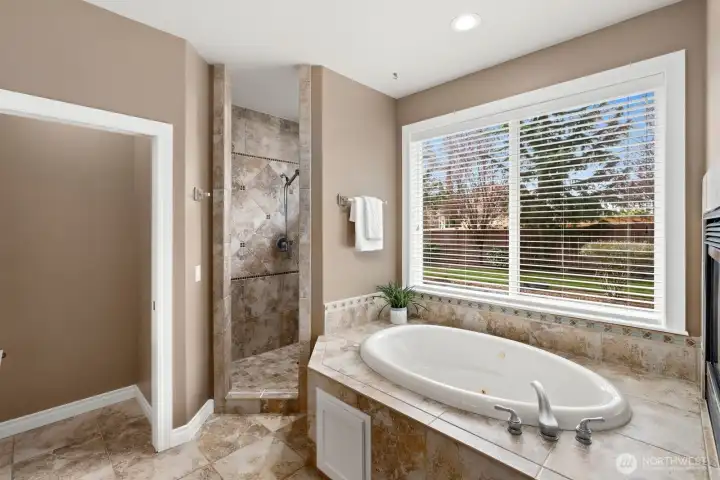 Custom walk in shower and soaking tub.