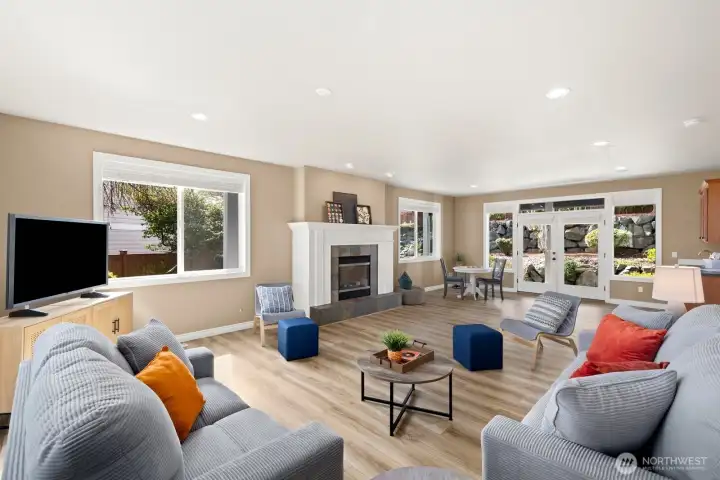 Downstairs living space with gas fireplace, private patio, kitchenette and more!