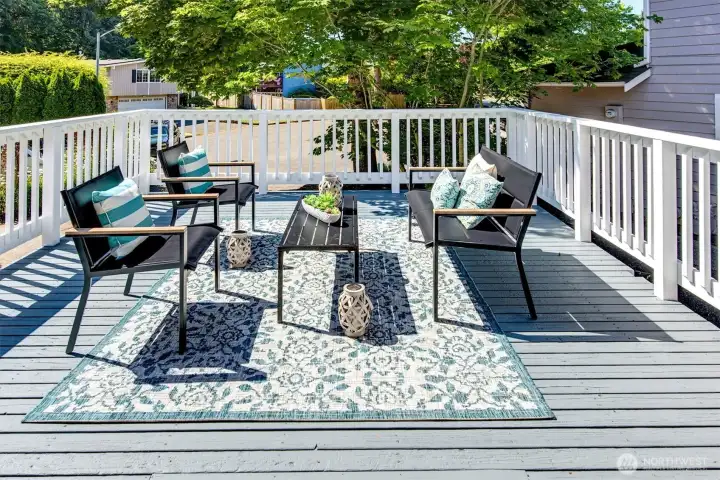 Spacious front deck gets lots of sun!