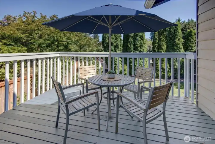 Virtually staged 2nd deck off the dining/kitchen area