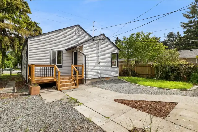 Private backyard great for entertaining. Backs up to the alley and detached garage in back