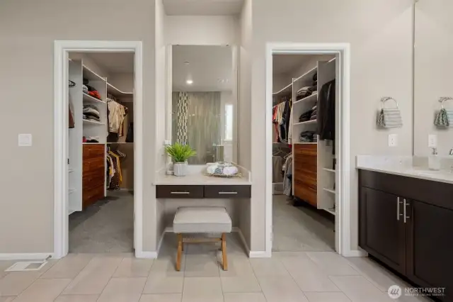 -- with double entry to the massive master closet, plus a built-in vanity space!