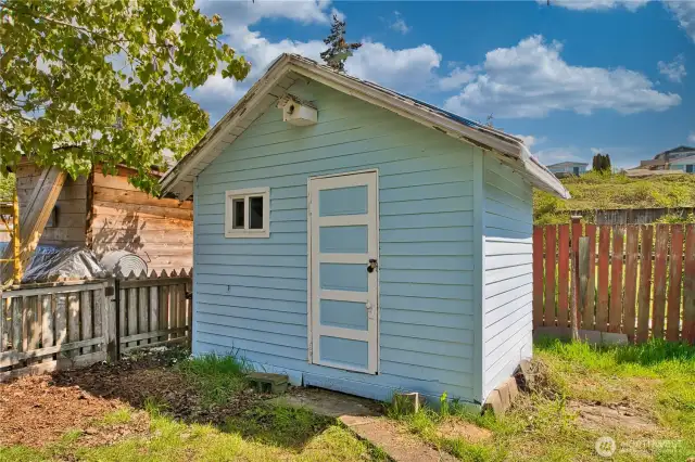 Garden shed at rear of home