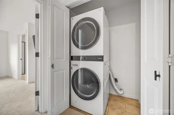 Hi-end x-large washer and dryer. Plenty of room for racks in same closet.