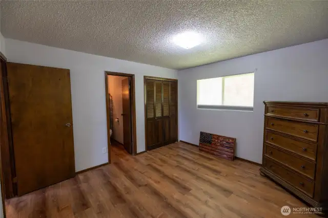 Primary bedroom with bathroom/shower.