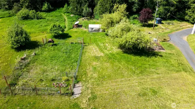 Massive 70x40 garden space with 6 ft fence.