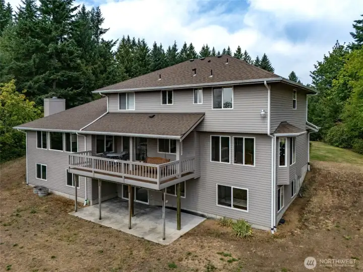 New roof in 2022, cement siding, and brick facade from aerial perspective