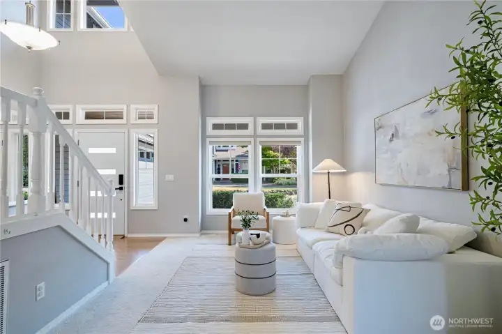 Open living area with vaulted ceiling