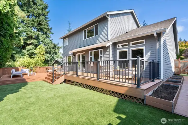 Upgraded backyard with TREX deck and artificial turf