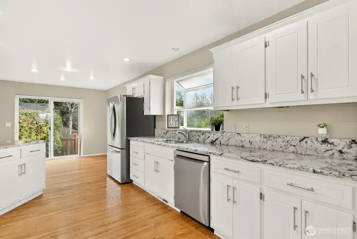 White cabinetry and Granite counters