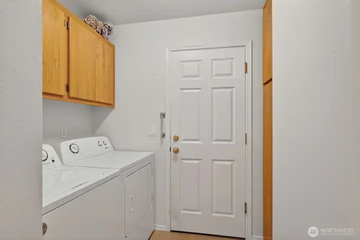 Laundry Room that leads out to garage