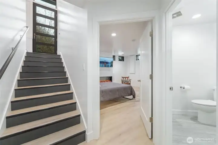 Downstairs to another Guest room and private bath