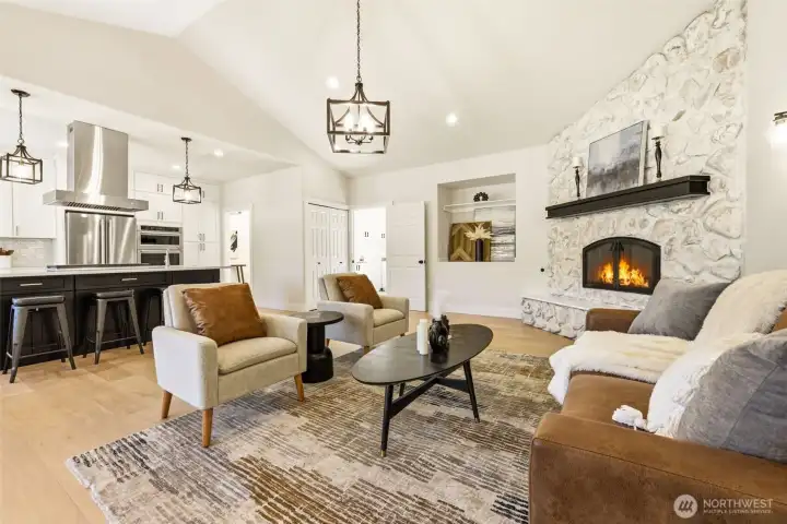 Open concept living room with soaring celiings.