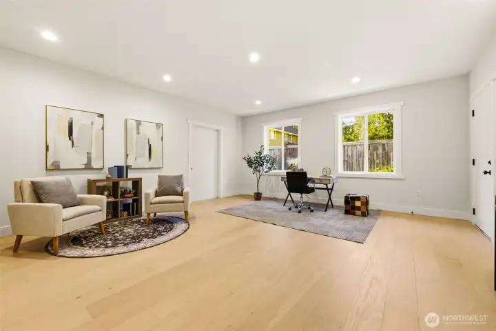 Office with a private outdoor entrance and passage to garage as well.