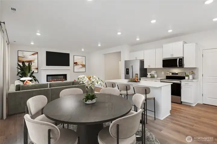 Dining area off of kitchen and living room.   Pictures are for representational purposes only, colors and features may vary.