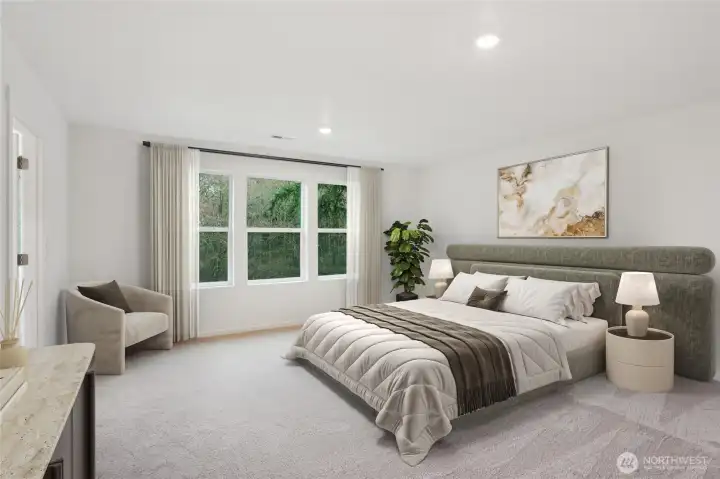 Primary bedroom with peaceful views of nature.   Pictures are for representational purposes only, colors and features may vary.