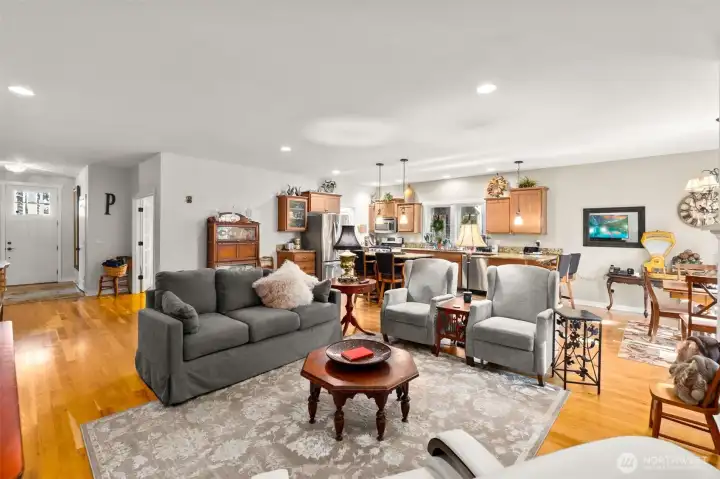 A warm entry way leads you into a spacious open concept living area