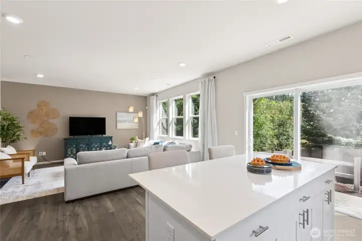 Solid 1 level island with overhang for bar stools. Great space for having coffee or meal prep!