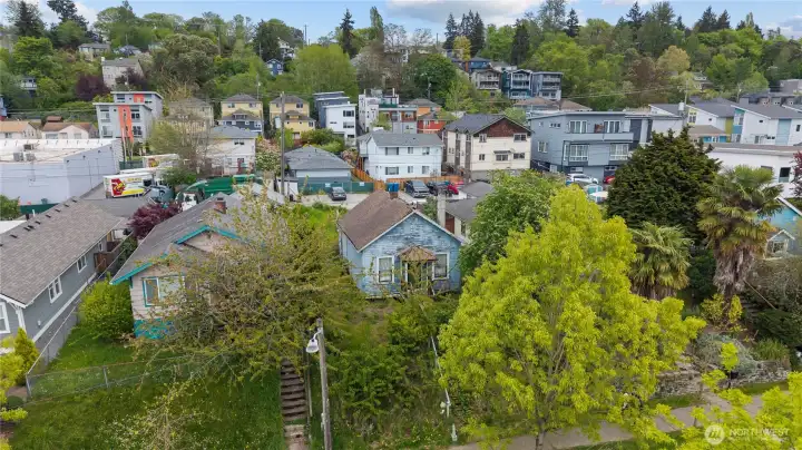 Aerial neighborhood view showing surrounding residential setting