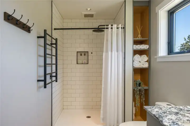 Towel warmer on the left.